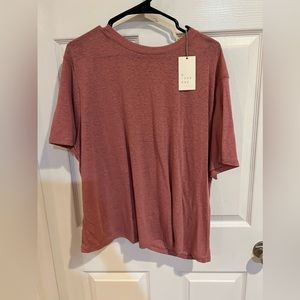 A new day tshirt. New with tags. Size XXL